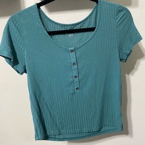 Blue buttoned shirt in size medium